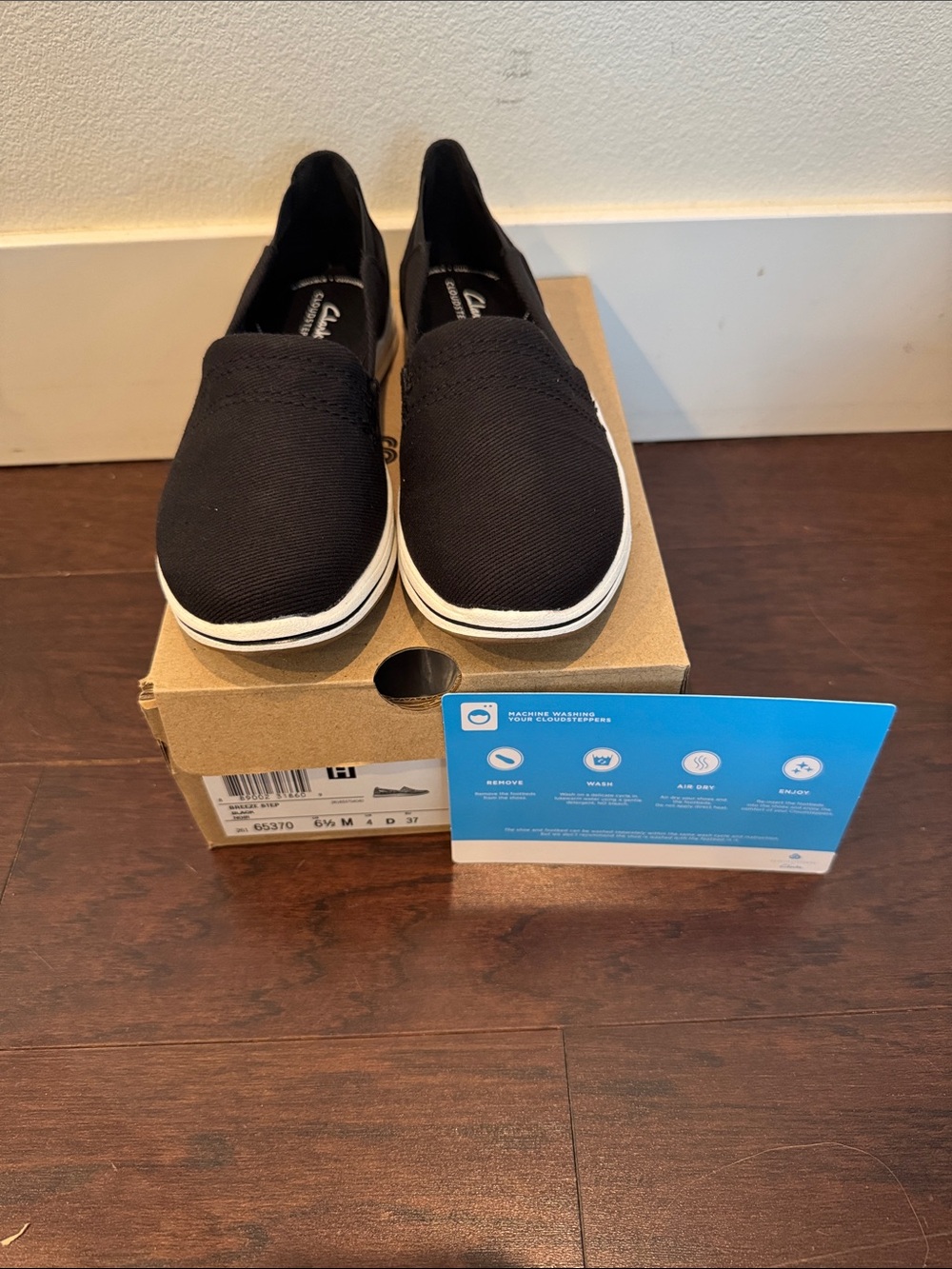 Clarks Black Slip-On Canvas Sneakers with White Trim